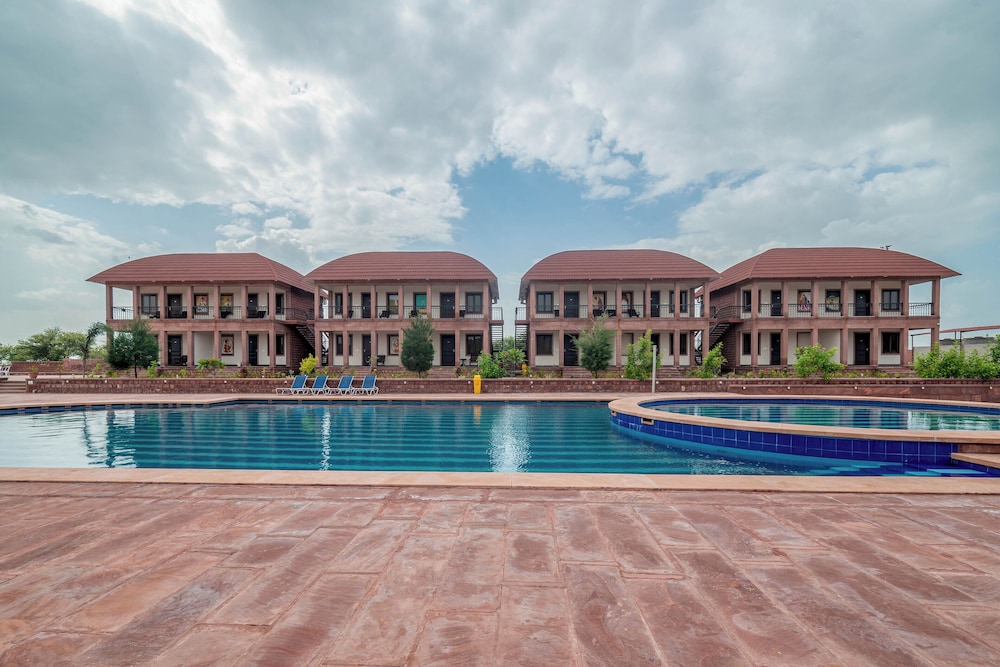 Pool-facing hospitality setting at The Gateway Osian